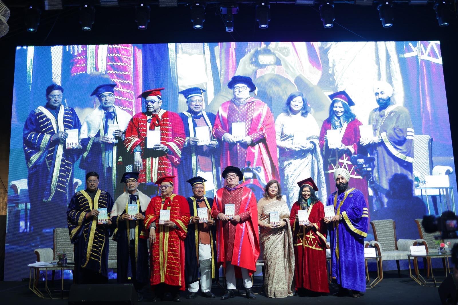 Robert de Sorbon convocation — Kirti Tyagi holding Mindful Athlete book on stage